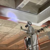 Air spraying intumescent coating